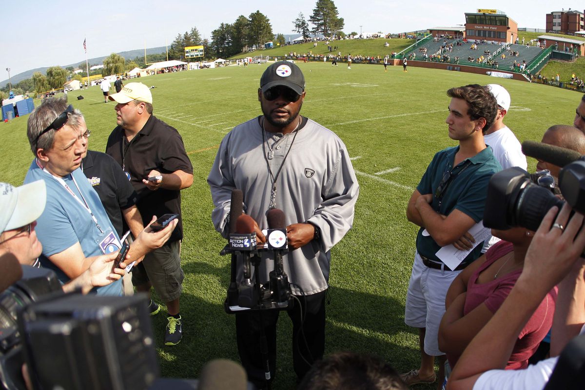 Mike Tomlin addressing the media at Latrobe during Steelers training camp 2014