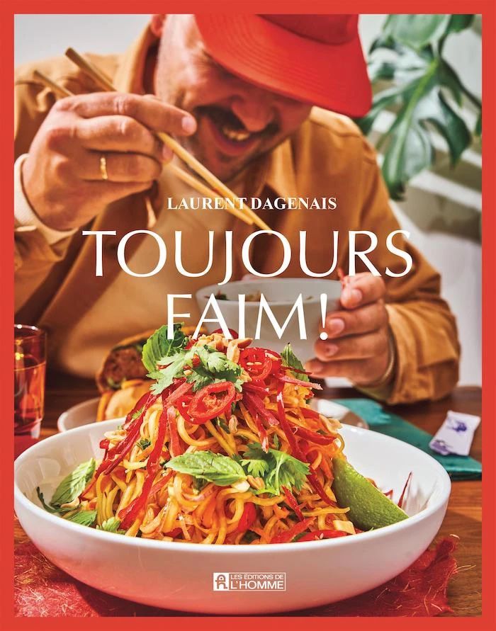 book cover with man wearing red cap digging into a bowl of noodles with chopsticks.