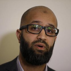 CAGE research director, Asim Qureshi talks at a press conference held by the CAGE human rights charity in London, Thursday, Feb. 26, 2015. A British-accented militant who has appeared in beheading videos released by the Islamic State group in Syria bears “striking similarities” to a man who grew up in London, a Muslim lobbying group said Thursday. Mohammed Emwazi has been identified by news organizations as the masked militant more commonly known as “Jihadi John.” London-based CAGE, which works with Muslims in conflict with British intelligence services, said Thursday its research director, Asim Qureshi, saw strong similarities, but because of the hood worn by the militant, “there was no way he could be 100 percent certain.” 