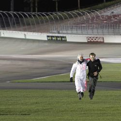 In this Road Block, Dave O'Leary, left, must sky dive in a high-tech light suit onto the Las Vegas Motor Speedway and then, with his teammate and son, Connor O'Leary, right, race to the finish line on the season finale of the All-Star edition of "The Amazing Race" on Sunday, May 18.