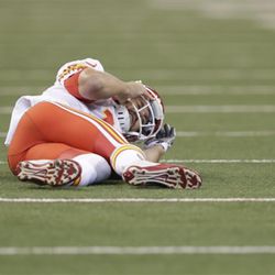 Kansas City Chiefs quarterback Alex Smith lays on the ground after getting hit during the first half of an NFL football game against the Indianapolis Colts, Sunday, Oct. 30, 2016, in Indianapolis. (AP Photo/Darron Cummings) 