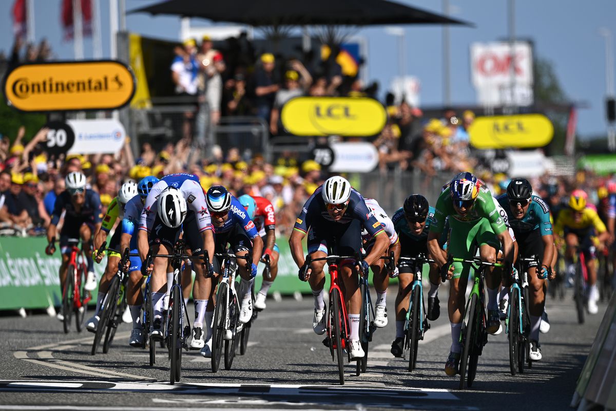 Fabio Jakobsen of Netherlands and Quick-Step - Alpha Vinyl Team, Mads Pedersen of Denmark and Team Trek - Segafredo and Wout Van Aert of Belgium and Team Jumbo - Visma Green Points Jersey sprint at finish line during the 109th Tour de France 2022, Stage 2 a 202,2km stage from Roskilde to Nyborg / #TDF2022 / #WorldTour / on July 02, 2022 in Nyborg, Denmark.
