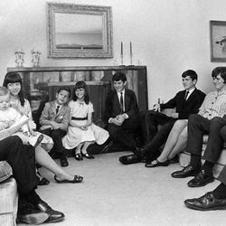 President Boyd K. Packer and his wife, Donna, and family at a family home evening in 1970. Children are (left to Rright) Eldon, Gayle, Lawrence, Kathleen, Spencer, Russell, Laurel, David and Allan. (One son, Kenneth, not shown, was serving a mission).