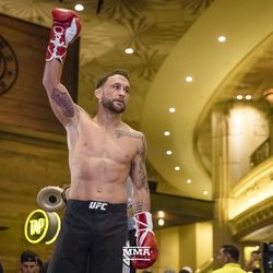 Frankie Edgar salutes the crowd at UFC 222 workouts.