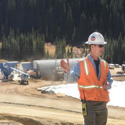 Steve Way, on-scene coordinator for the EPA, stands in front of the new facility on Thursday, Oct. 15, 2015, north of Silverton, Colo., that will treat water coming out of the Gold King Mine  by adding lime to raise the pH before separating solids from liquids. Way said the treated water will be released into Cement Creek.
