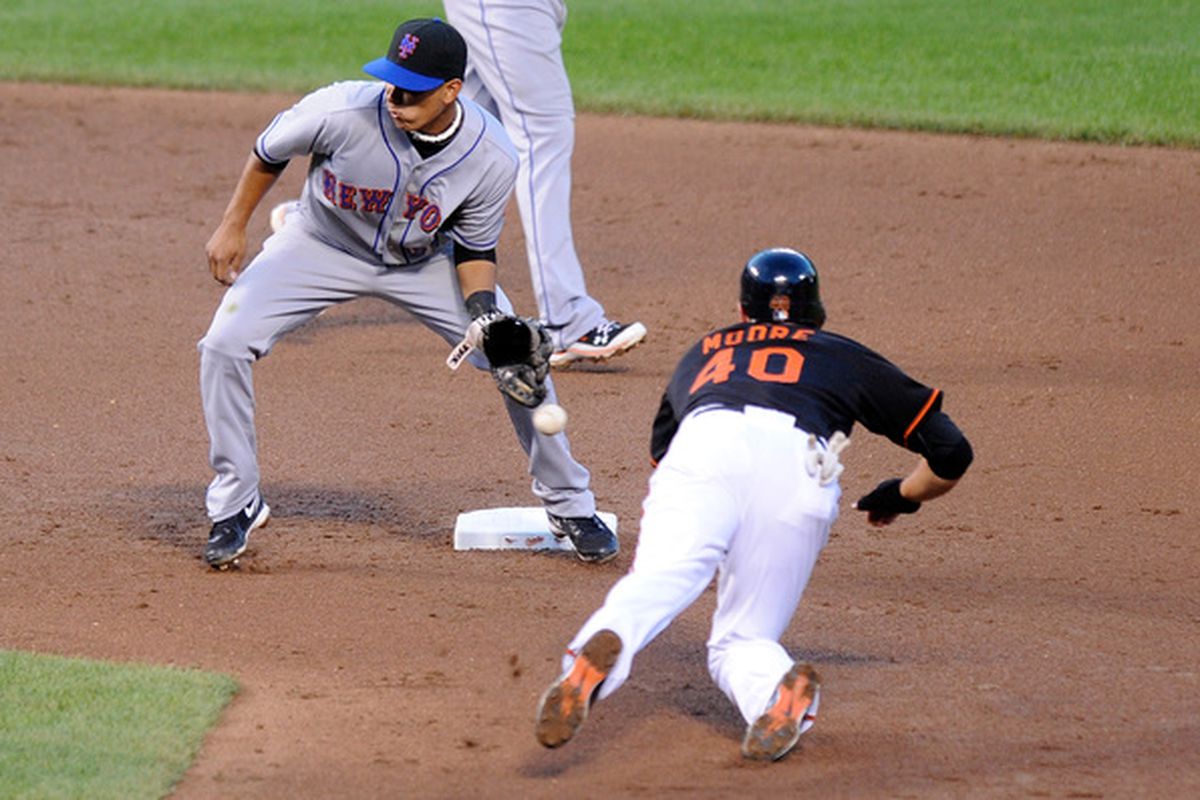 Scott Moore steals second base. Why is b2b still on this team? (Photo by Greg Fiume/Getty Images)