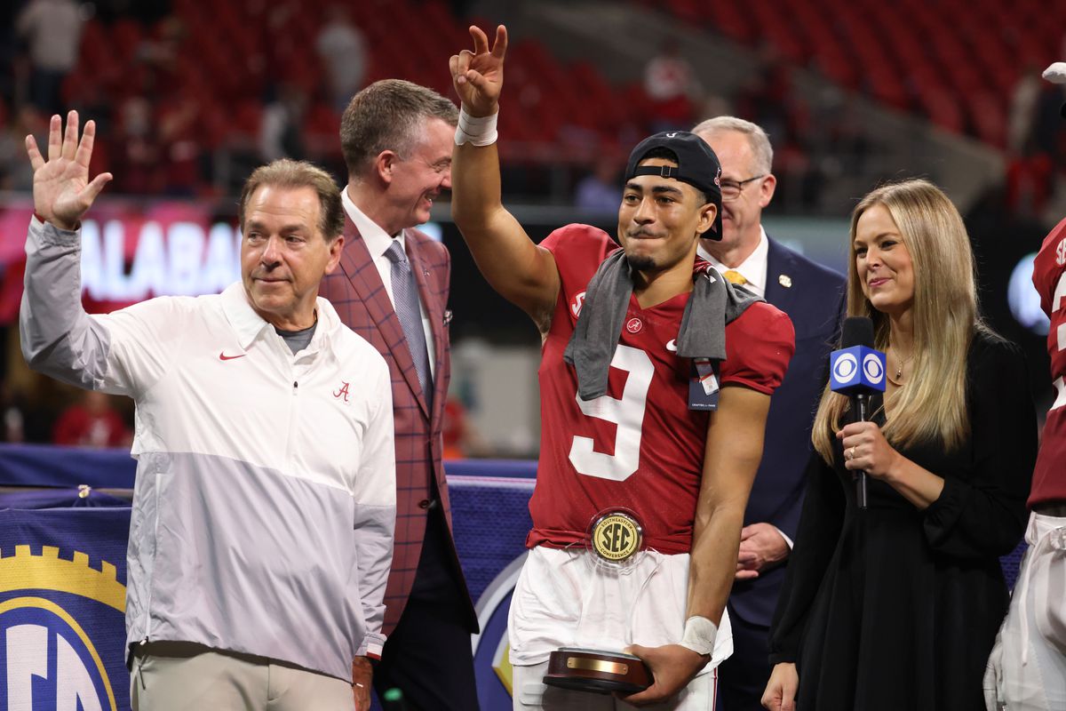 Alabama Crimson Tide head coach Nick Saban, left, and quarterback Bryce Young celebrate their win against the Georgia Bulldogs during the SEC championship game at Mercedes-Benz Stadium.&nbsp;