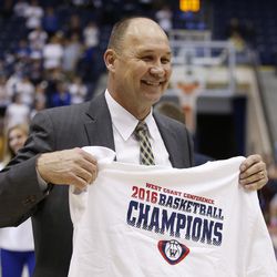 Brigham Young Cougars head coach Jeff Judkins celebrates the win over the San Diego Toreros in Provo Thursday, Feb. 18, 2016. BYU won 68-60 and won the West Coast Conference championship. 
