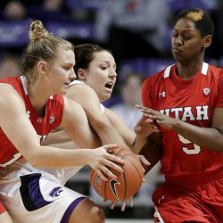 Kansas State guard Brittany Chambers, center, tries to steal the ball from Utah forward Taryn Wicijowski, left, and guard Cheyenne Wilson, right, during the second half of a women's NIT college basketball semifinal, Wednesday, April 3, 2013, in Manhattan, Kan. Utah won 54-46 in overtime. (AP Photo/Charlie Riedel)