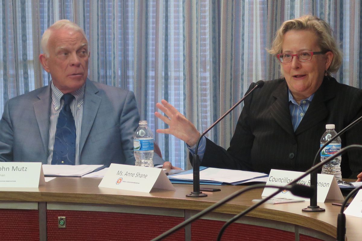 Indianapolis Charter School Board members  John Mutz and Anne Shane ask questions about a plan for a new charter school in the Marion County Juvenile Detention Center.