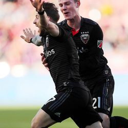 D.C. United forward Paul Arriola (7) and teammate D.C. United midfielder Chris Durkin (21) celebrate after Arriola's goal as Real Salt Lake and D.C. United play an MLS Soccer match at Rio Tinto Stadium in Sandy on Saturday, May 12, 2018.