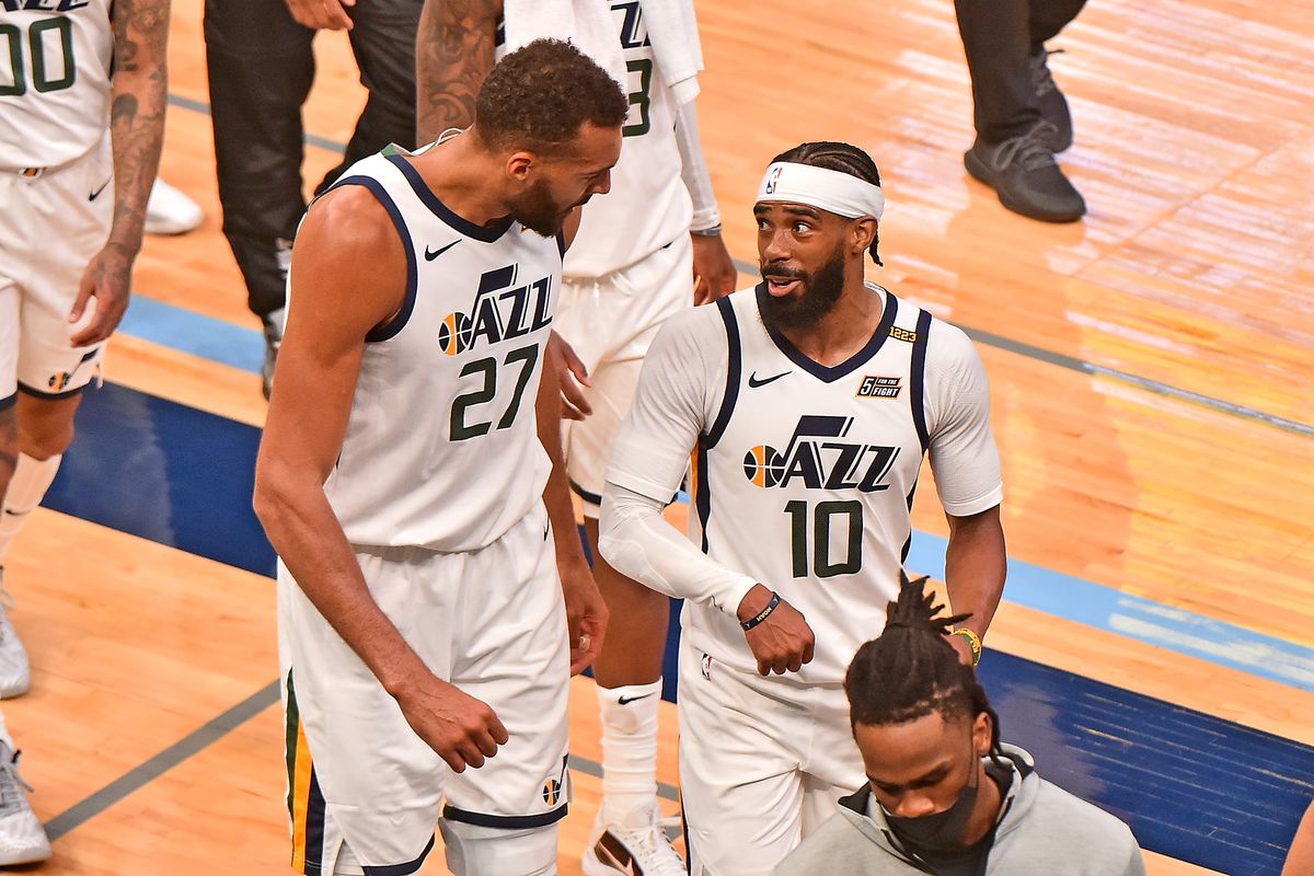 Rudy Gobert of the Utah Jazz and Mike Conley against the Memphis Grizzlies during Round 1, Game 3 of the 2021 NBA Playoffs on May 29, 2021 at FedExForum in Memphis, Tennessee.