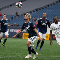 FOXBOROUGH, MA - MARCH 24: New England Revolution midfielder Diego Fagundez #14 prepares to settle a bouncing ball at Gillette Stadium on March 24, 2019 in Foxborough, Massachusetts. (Photo by J. Alexander Dolan - The Bent Musket)
