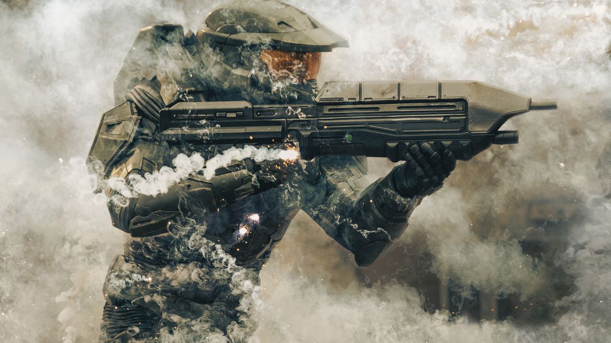 Master Chief fights his way through a smokey explosion in the Paramount Plus series Halo