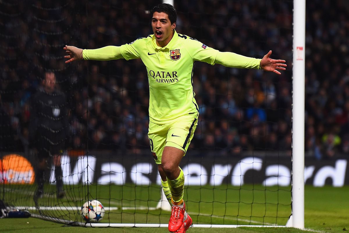 Luis Suarez of Barcelona celebrates scoring their second goal during the UEFA Champions League Round of 16 match between Manchester City and Barcelona at Etihad Stadium on February 24, 2015 in Manchester, United Kingdom.
