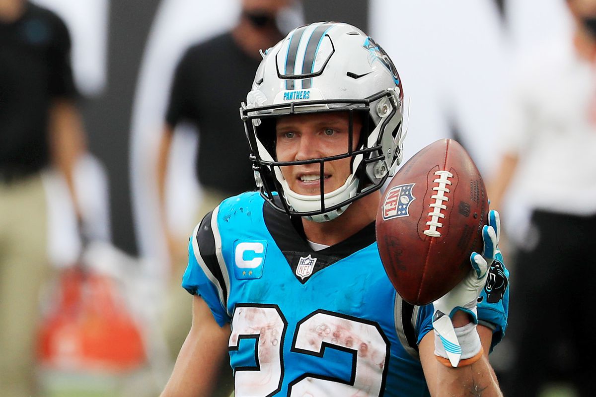 Christian McCaffrey of the Carolina Panthers celebrates after scoring a touchdown during the third quarter against the Tampa Bay Buccaneers at Raymond James Stadium on September 20, 2020 in Tampa, Florida.