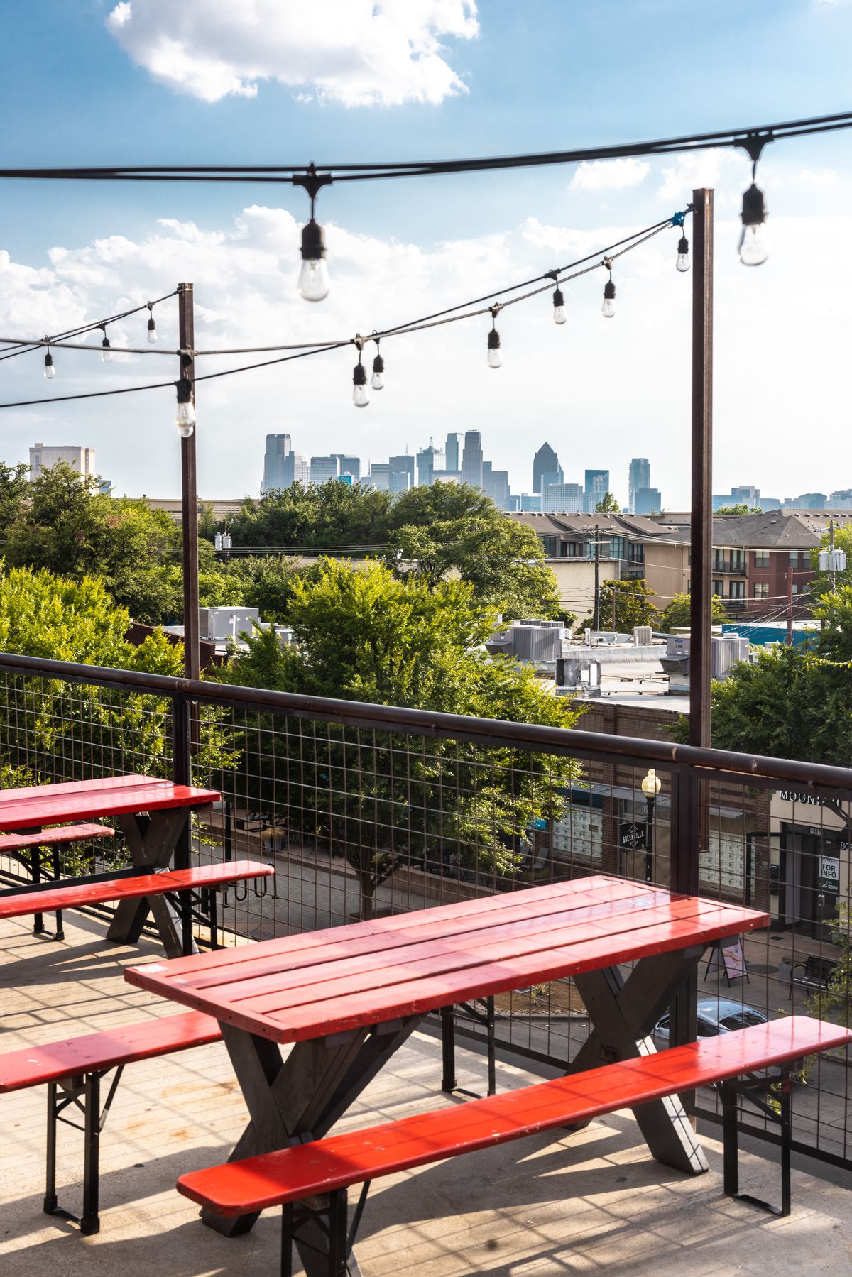 A roof deck offers a view of downtown Dallas’s skyline.