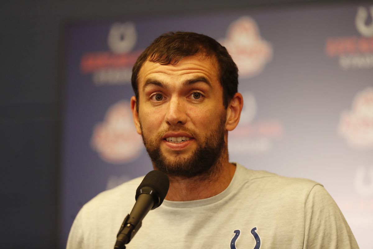 Indianapolis Colts quarterback Andrew Luck stands at a podium to announced his retirement from the NFL.
