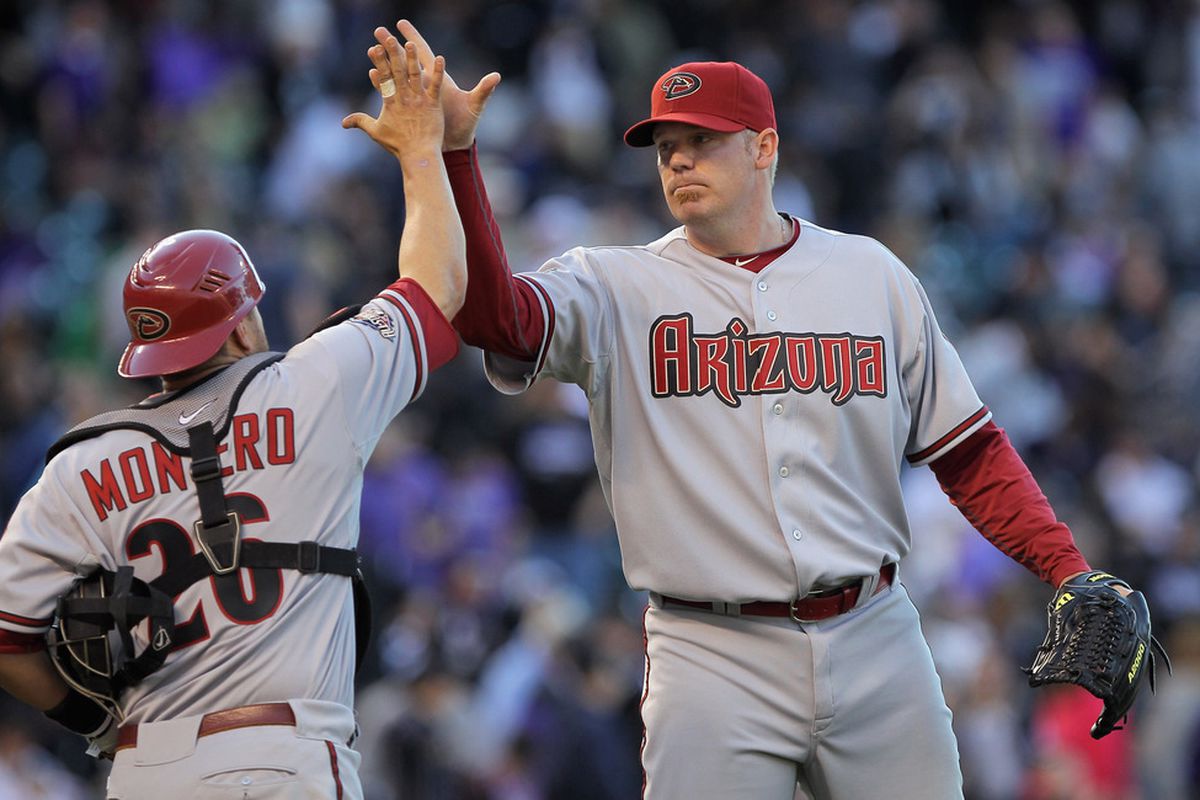 Is J.J. Putz a giant, or is Miguel Montero roughly DBacksSkins sized? Or is Putz just standing on the mound as he high-fives his catcher?