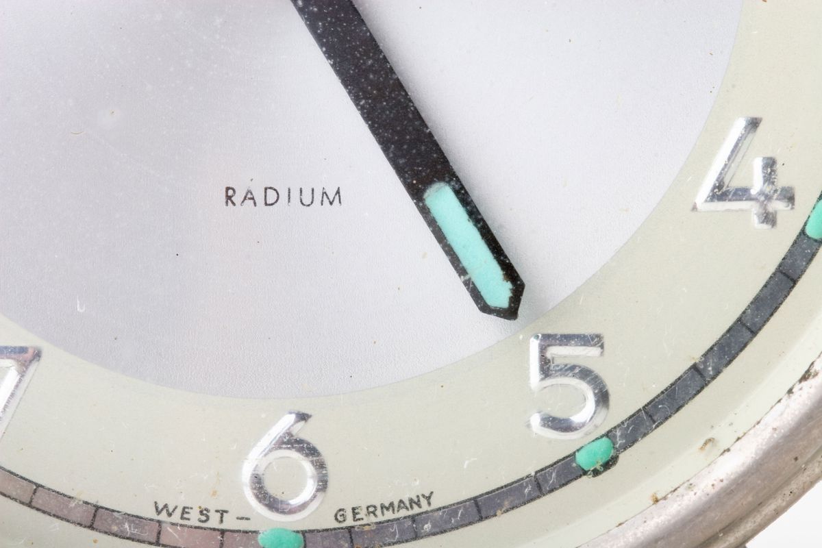 An old watch face with glow in the dark radium dials.