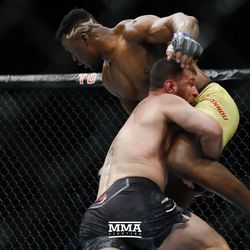 Stipe Miocic attempts another takedown at UFC 220.