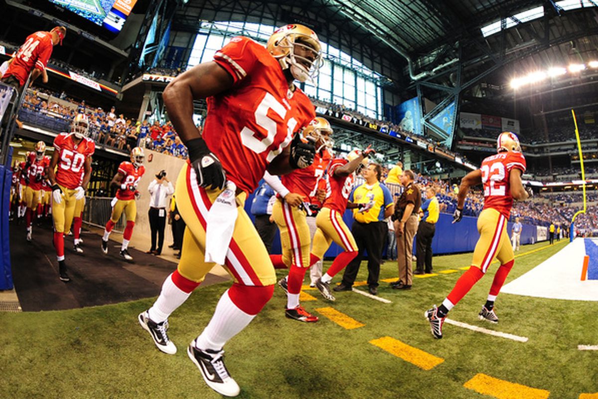 INDIANAPOLIS - AUGUST 15: Takeo Spikes #51 of the San Francisco 49ers takes the field before a preseason game against the Indianapolis Colts at the Lucas Oil Stadium on August 15 2010 in Indianapolis Indiana. (Photo by Scott Cunningham/Getty Images)