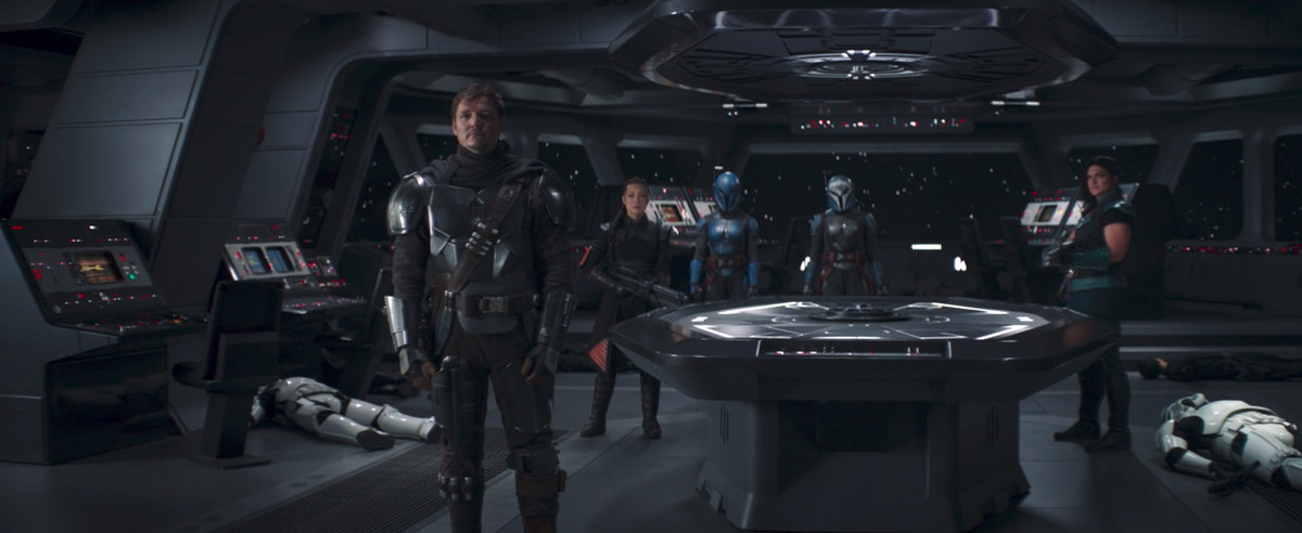 Din Djarin, Fennec Shand, Koska Reeves, Bo-Katan, and Cara Dune stand on the bridge of an Imperial ship in The Mandalorian
