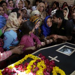 Pakistani Christian women mourn the death of Sharmoon who was killed in a bombing attack, in Lahore, Pakistan, Monday, March 28, 2016. The death toll from a massive suicide bombing targeting Christians gathered on Easter in the eastern Pakistani city of Lahore rose on Monday as the country started observing a three-day mourning period following the attack. 