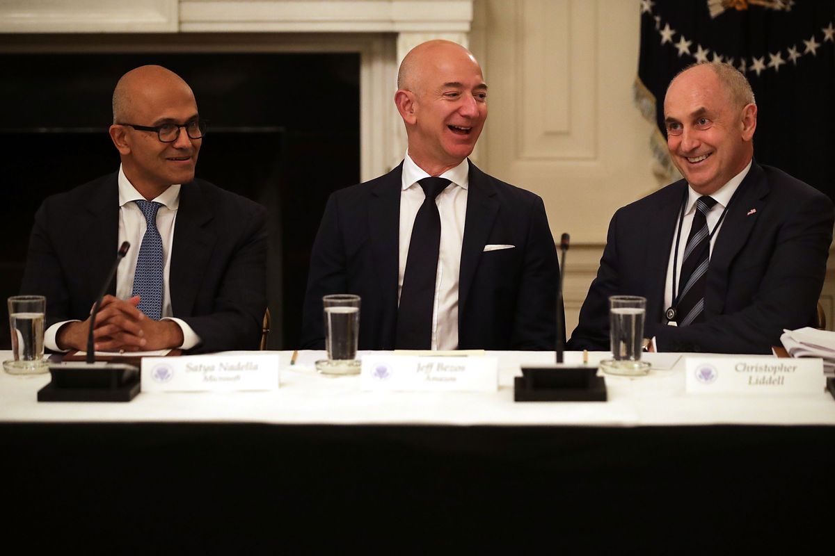 left to right: Microsoft CEO Satya Nadella, Amazon CEO Jeff Bezos and former Microsoft CFO Chris Liddell at President Trump’s tech summit