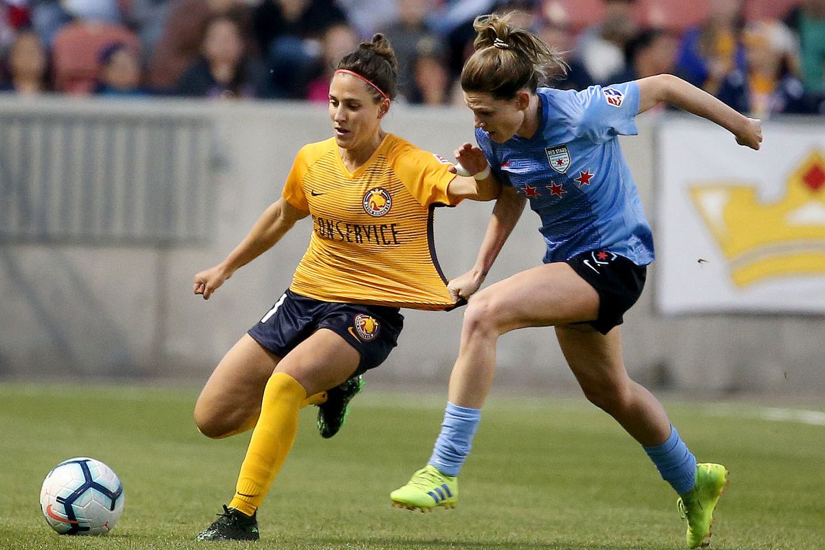Utah Royals FC midfielder Vero Boquete keeps the ball from Chicago Red Stars defender Arin Gilliland at Rio Tinto Stadium in Sandy on Friday, May 3, 2019.