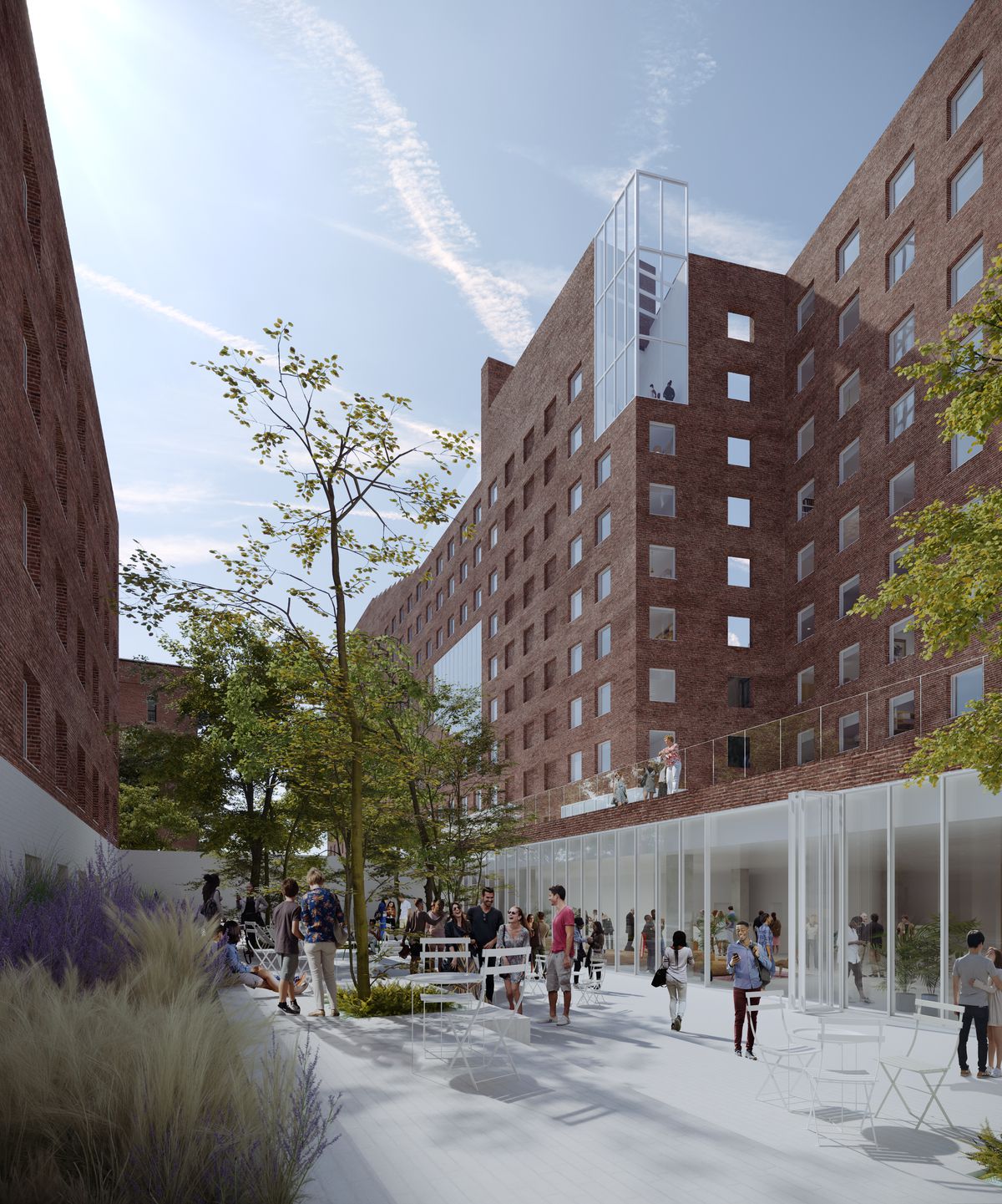 A digital rendering shows a red brick building with  enclosed glass spaces that allow visitors to glimpse at the space within. At the base of the building is a populated plaza with tables, chairs and trees.