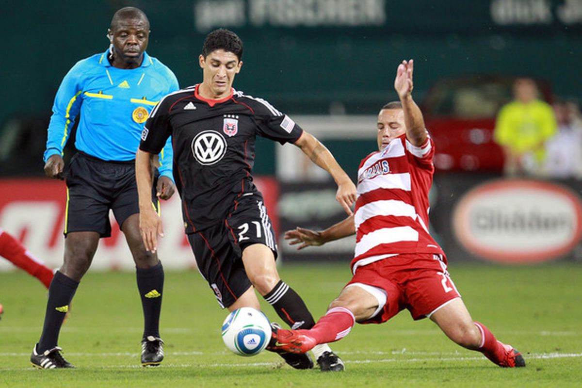 WASHINGTON - AUGUST 14: Daniel Hernandez #2 of FC Dallas defends the ball against Pablo Hernandez #21 of D.C. United at RFK Stadium on August 14 2010 in Washington DC. (Photo by Ned Dishman/Getty Images)