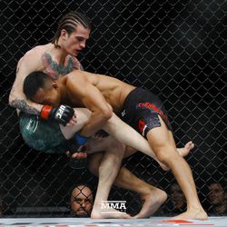 Andre Soukhamthath gets a takedown at UFC 222.