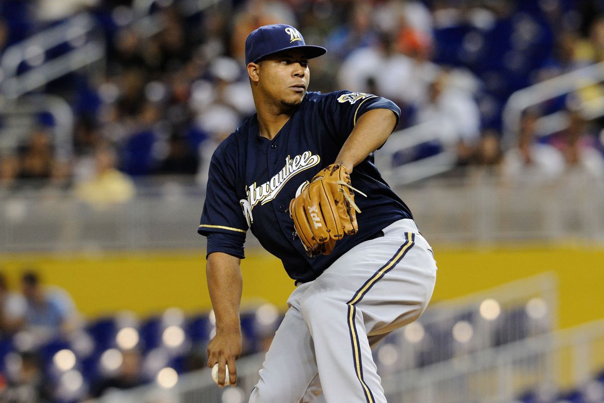 Sept 5, 2012; Miami, FL, USA; Milwaukee Brewers pitcher Wily Peralta (60) scrunches up to fit into this tiny box against the Miami Marlins at Marlins Park. Mandatory Credit: Steve Mitchell-US PRESSWIRE