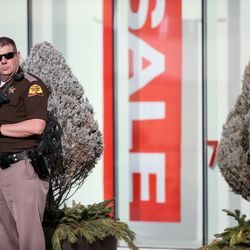 Law enforcement officers respond after a shooting at Fashion Place Mall in Murray on Sunday, Jan. 13, 2019.