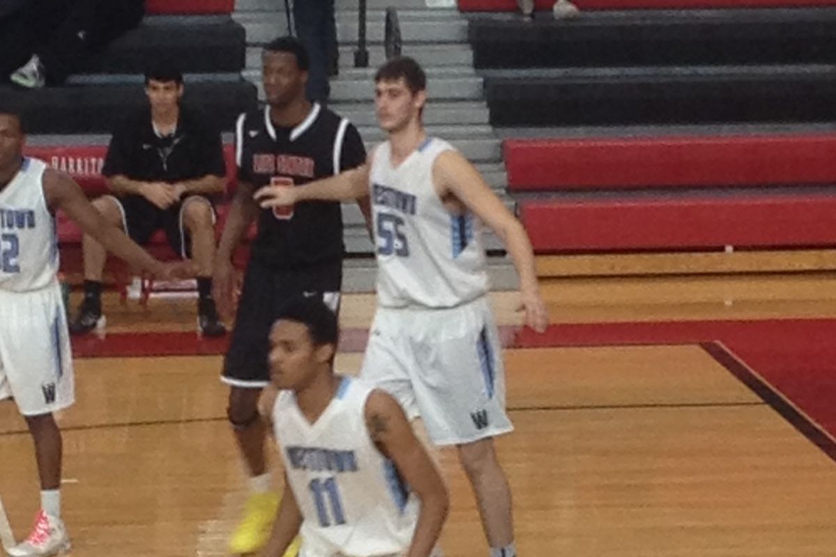 Clockwise: Trayvon Reed (5 in black); Georges Papagiannis (55 in white); Jared Nickens (11 in white)
