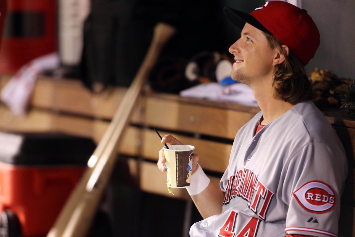 July 27, 2012; Denver, CO, USA; Cincinnati Reds pitcher Bronson Arroyo (61) in the dugout after being taken out of the game during the seventh inning against the Colorado Rockies at Coors Field.  Mandatory Credit: Chris Humphreys-US PRESSWIRE