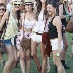 Model Alessandra Ambrosia posing with fans, looking every bit of bohemian. Until next time, 'Chella!