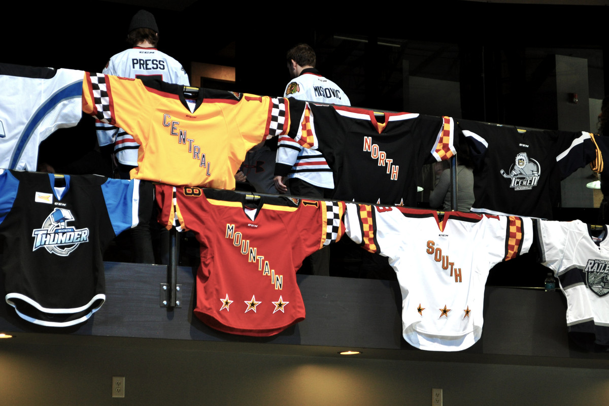 ECHL All-Star Division jerseys hanging on display at the 2018 ECHL All-Star Game Fan Fest in Indianapolis, Indiana.