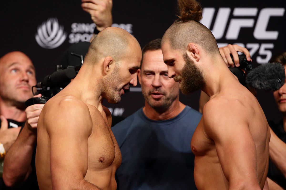 Glover Teixeira&nbsp;of Brazil (L) and Jiri Prochazka of Czech Republic (R) face off during the UFC 275 Weigh-Ins at Singapore Indoor Stadium on June 10, 2022 in Singapore.