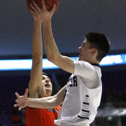 Brighton held on for a 65-56 victory over Hunter in the 5A boys state basketball quarterfinals at the Dee Events Center in Ogden Wednesday, Feb. 25, 2015.