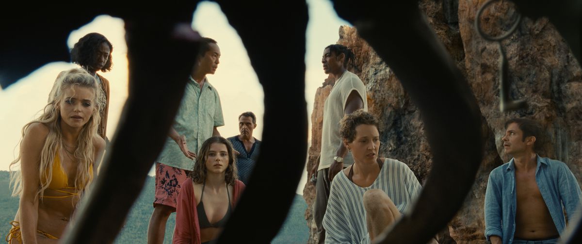 Beachgoers discover a skeleton in M. Night Shyamalan’s Old.