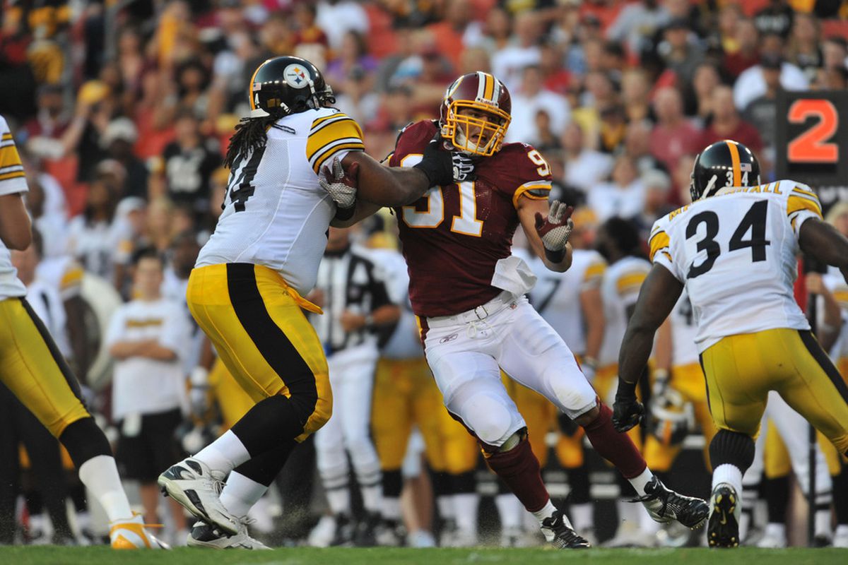 LANDOVER, MD - AUGUST 12:  Ryan Kerrigan #91 of the Washington Redskins defends against the Pittsburgh Steelers  at FedExField on August 12, 2011 in Landover, Maryland. The Redskins defeated the Steelers 16-7. (Photo by Larry French/Getty Images)