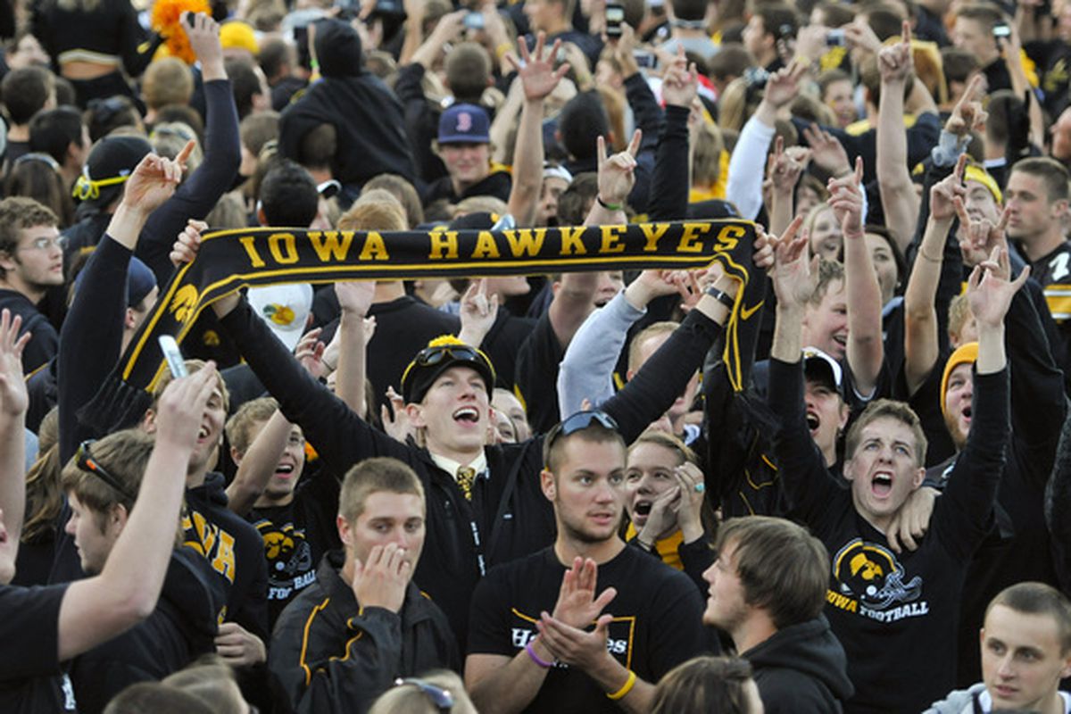 IOWA CITY IA - OCTOBER 30: University of Iowa Hawkeyes fans celebrate their win over the Michigan State Spartans at Kinnick Stadium on October 30 2010 in Iowa City Iowa. Iowa won 37-6 over Michigan State. (Photo by David Purdy/Getty Images)