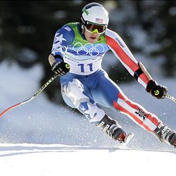 Bode Miller of the United States speeds down the course during the men's super-G at the Vancouver 2010 Olympics in Whistler, British Columbia, Friday.