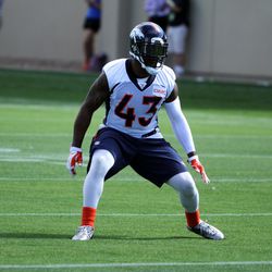 Broncos safety T.J. Ward reads and reacts during drills.