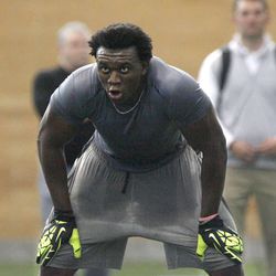 BYU's Ezekiel Ansah runs through drills during the 2013 Pro Day at BYU in Provo on Thursday, March 28, 2013.  