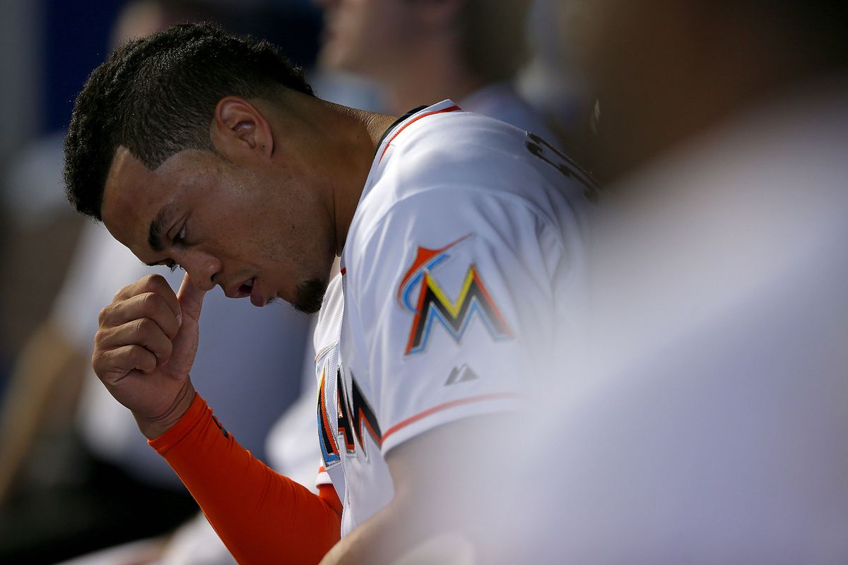 Giancarlo Stanton and the Miami Marlins' position players are not going to enjoy their grades from this season.
