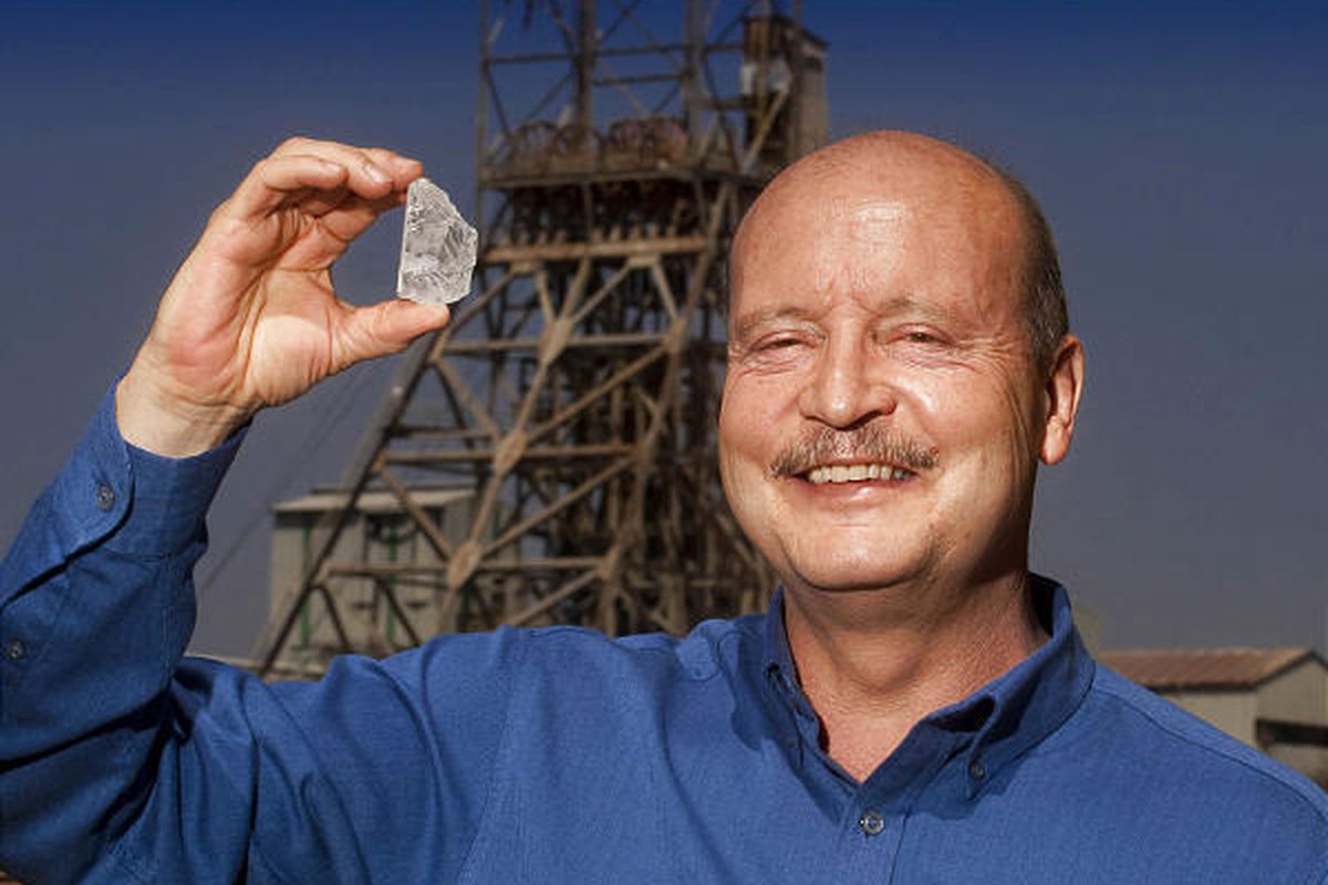 Petra Diamonds CEO Johan Dippenaar holds 507-carat diamond found in South Africa.