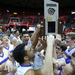 Bingham celebrates its 61-44 win over Copper Hills in the 5A basketball championship in the Huntsman Center at the University of Utah Saturday, March 5, 2016. 